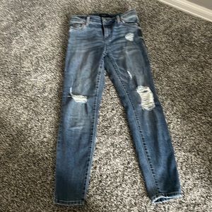 Distressed skinny jeans